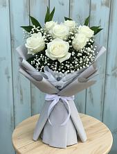 Букет цветов из:  Розы в Монетный